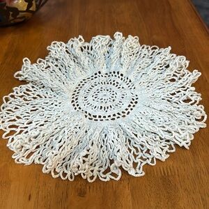 Handmade doilie. Off white. Had been washed and not starched. No rips tears